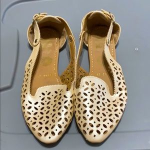 Golden flat shoes